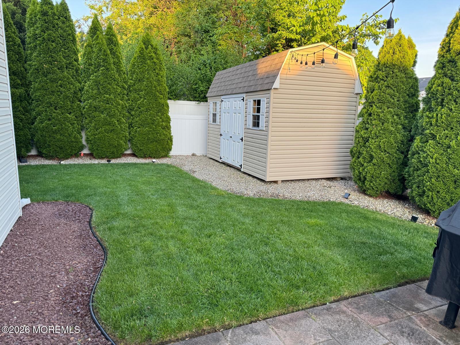 40 Pinyon Street Howell, NJ 07731 - Photo 21 of 29 a view of a back yard of the house
