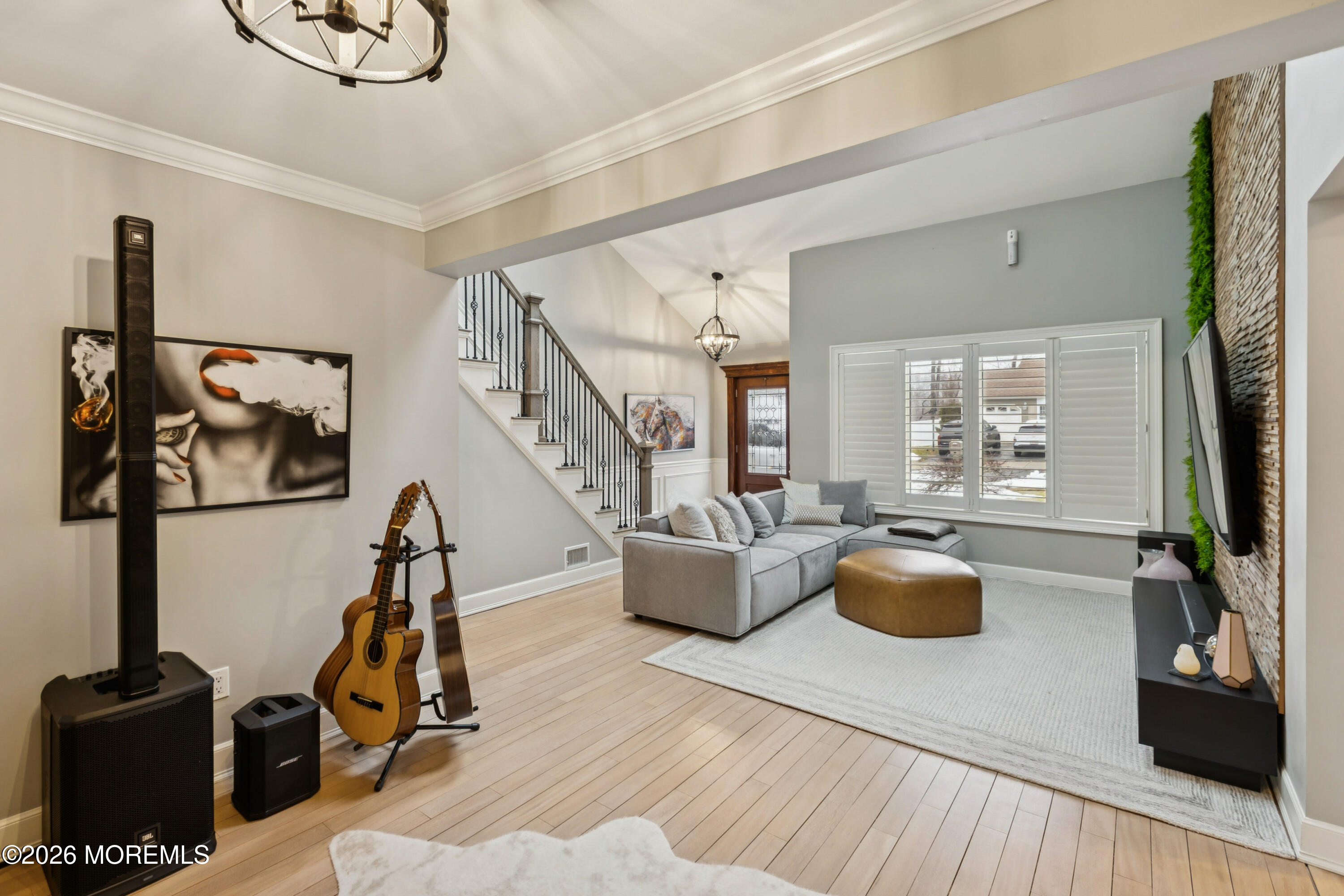 40 Pinyon Street Howell, NJ 07731 - Photo 3 of 29 a living room with furniture a flat screen tv and a large window