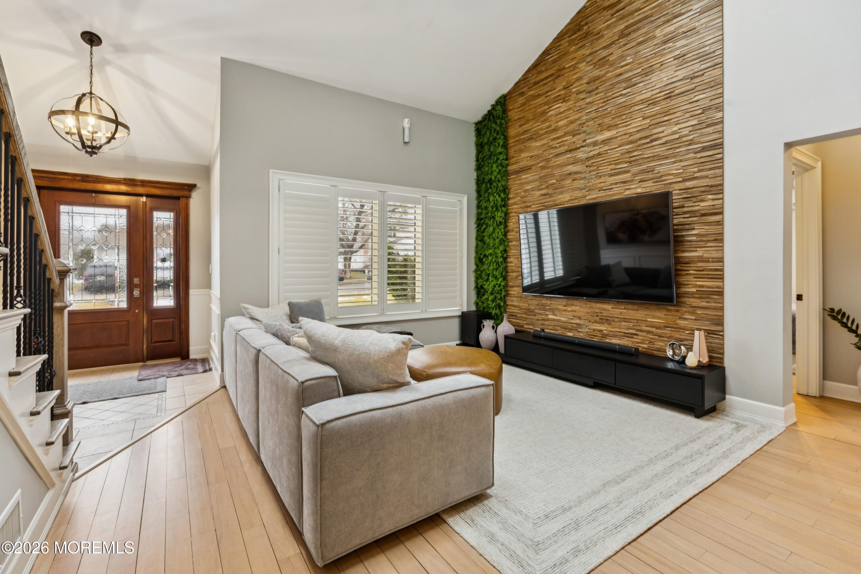 40 Pinyon Street Howell, NJ 07731 - Photo 4 of 29 a living room with furniture and a fireplace