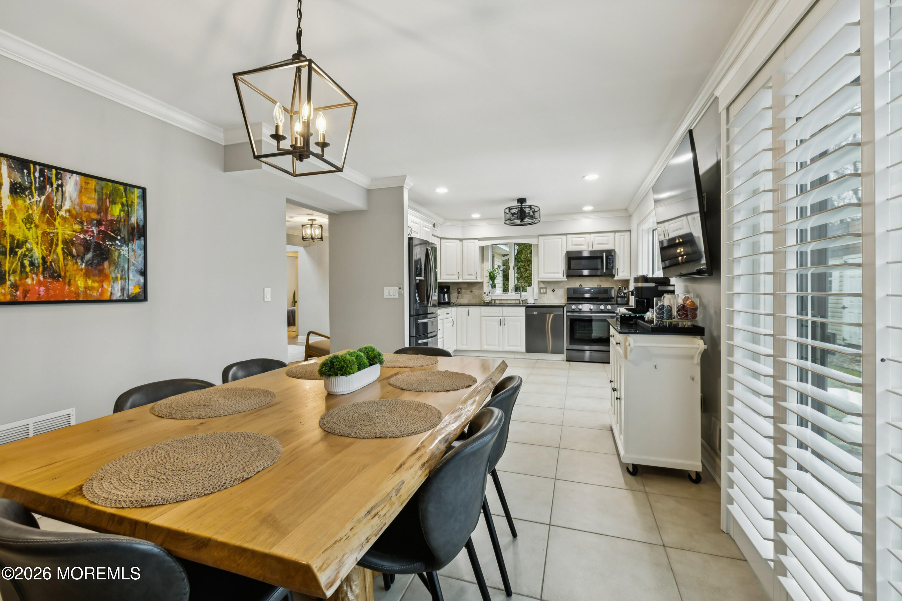 40 Pinyon Street Howell, NJ 07731 - Photo 8 of 29 a kitchen with stainless steel appliances granite countertop a sink and cabinets