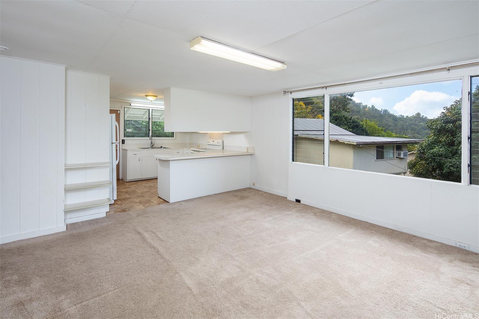 a view of a kitchen with a sink