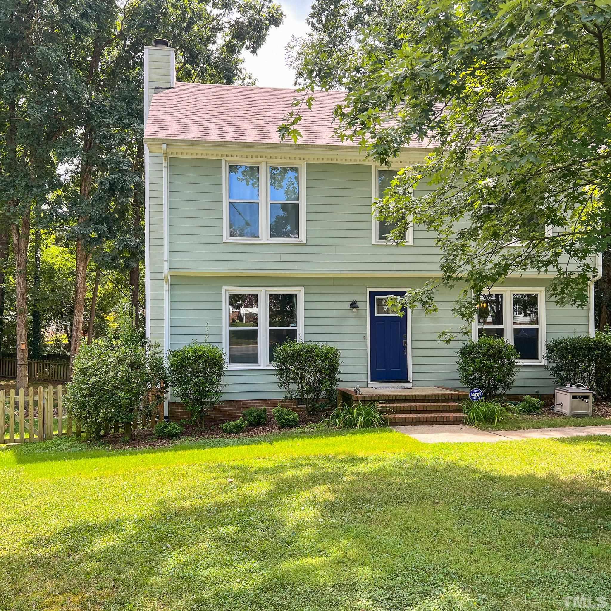 8112 Bentwood Place Raleigh, NC 27615 - Photo 2 of 24 a front view of house with yard and outdoor seating