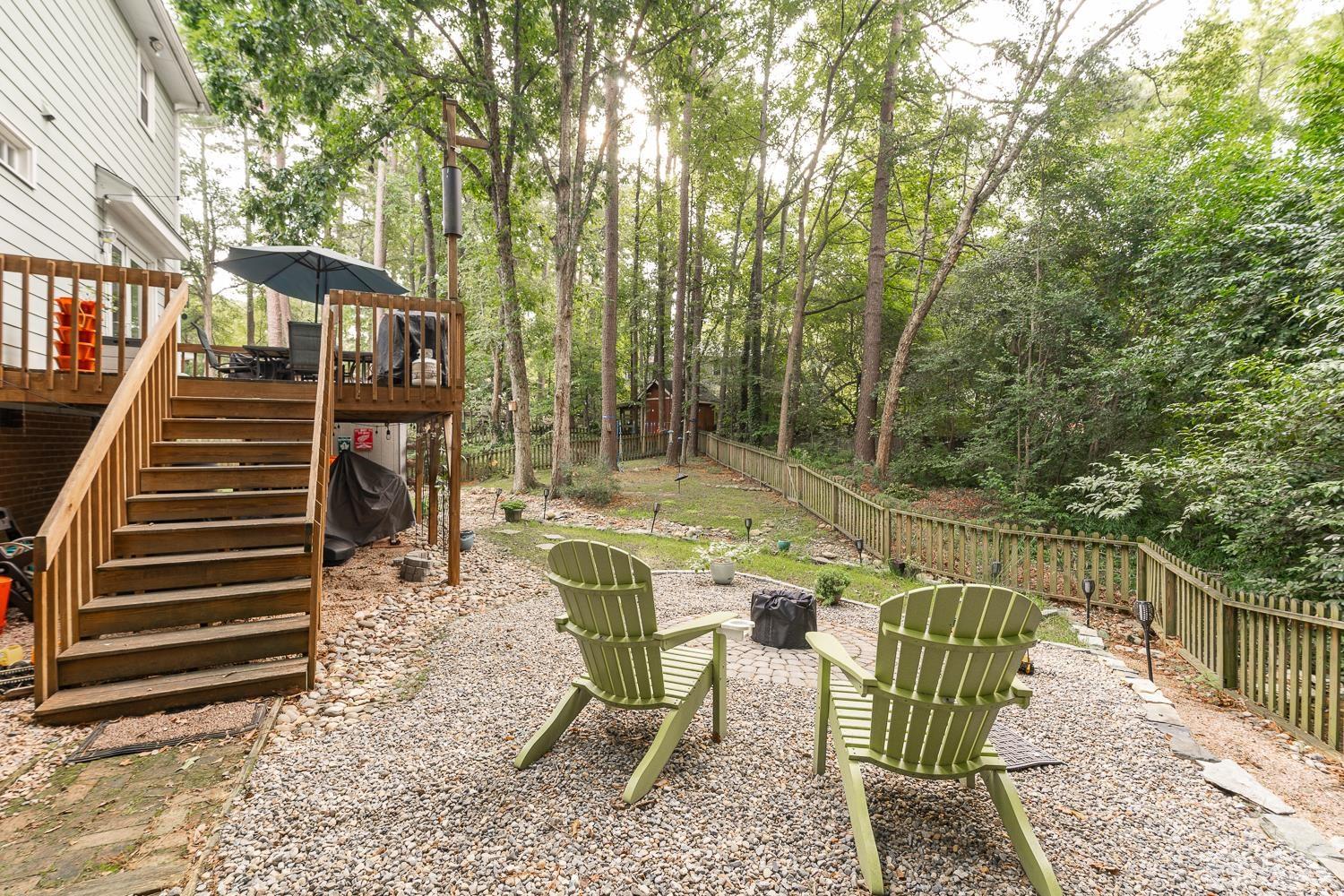 8112 Bentwood Place Raleigh, NC 27615 - Photo 5 of 24 a view of two chairs in a balcony