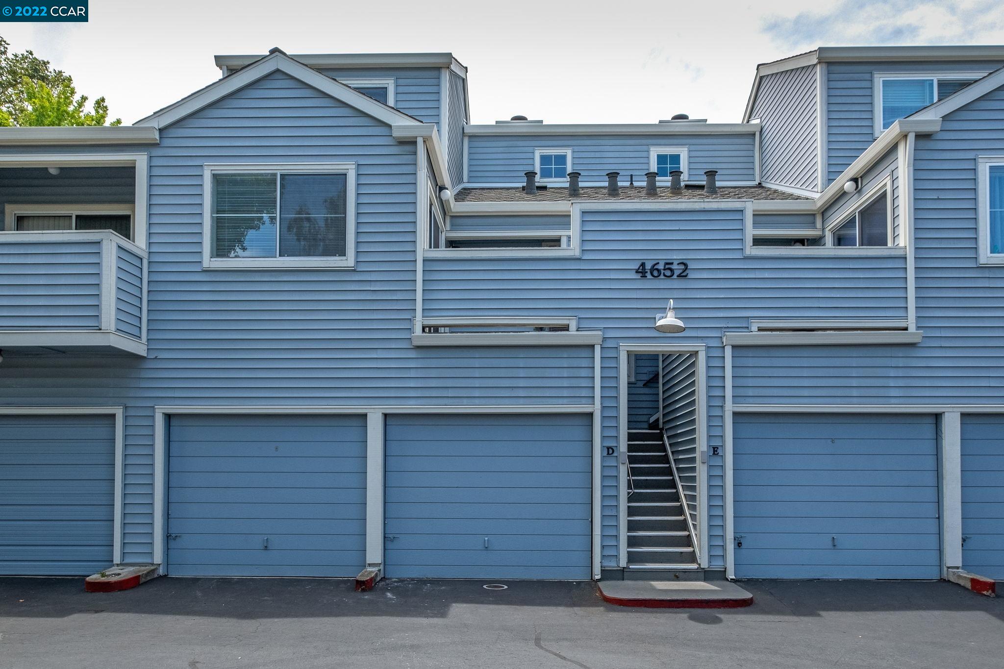 4652 Melody Drive, Unit D Concord, CA 94521 - Photo 1 of 1 a view of a house and garage