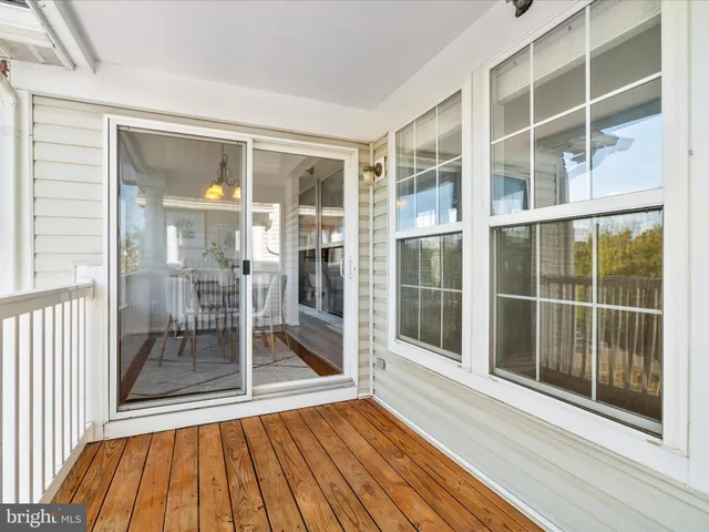 a view of a room with a large window