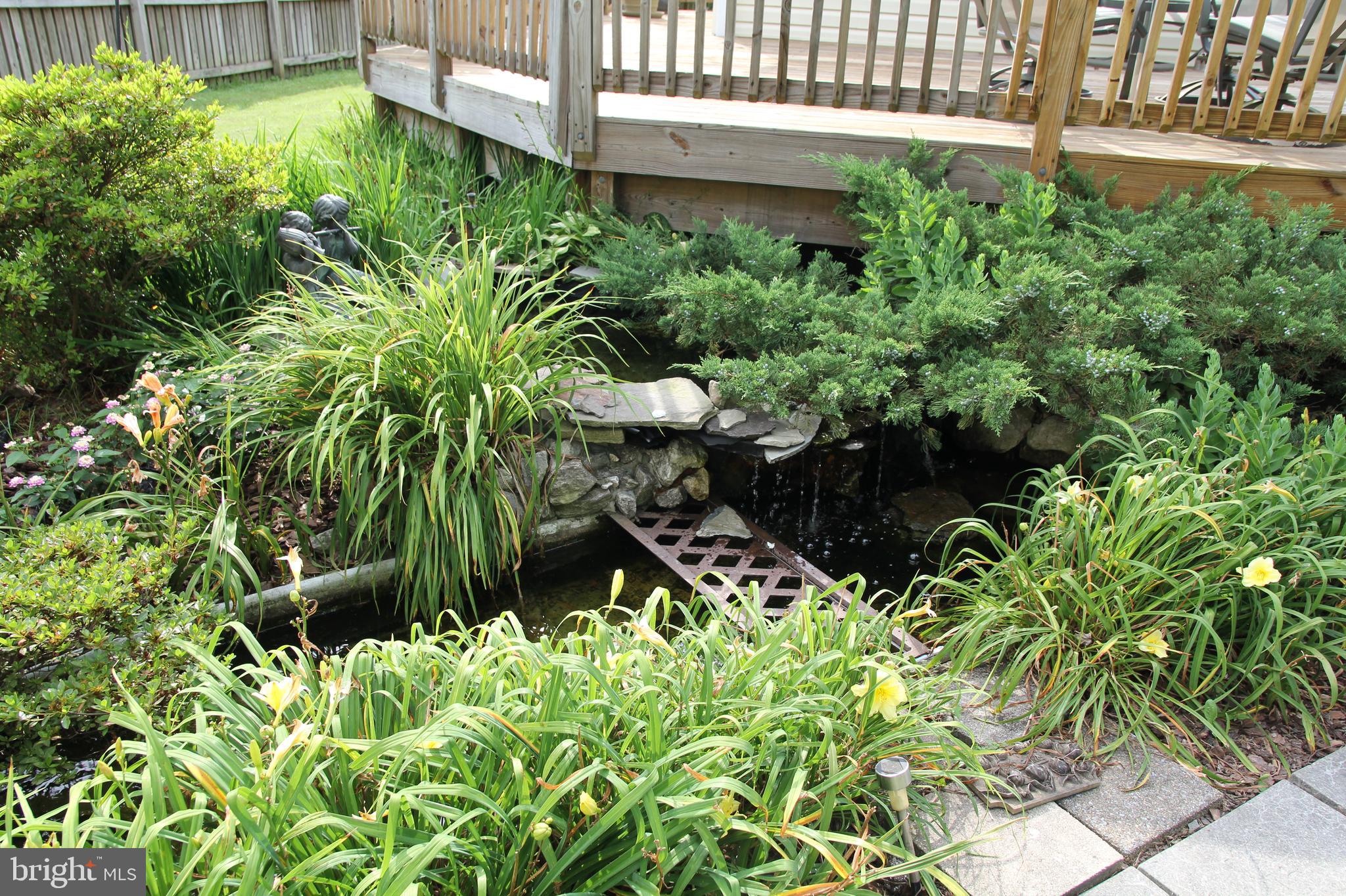 5029 Chalk Point Road West River, MD 20778 - Photo 21 of 23 Beautiful Landscaping and a pond.