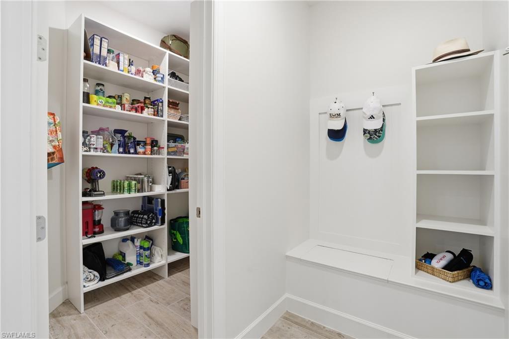 17210 Ashcomb Way Estero, FL 33928 - Photo 30 of 47 a room with storage and utility