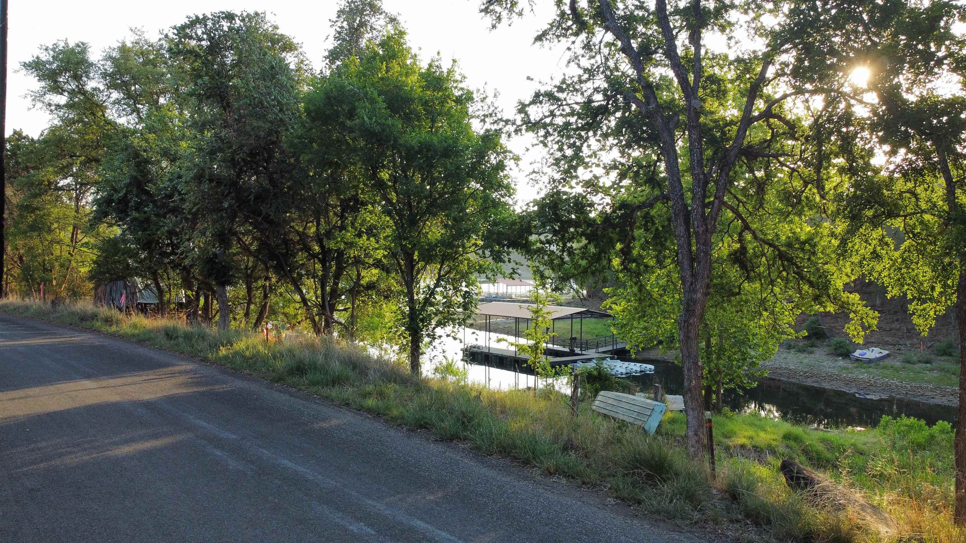 a view of a street with a trees
