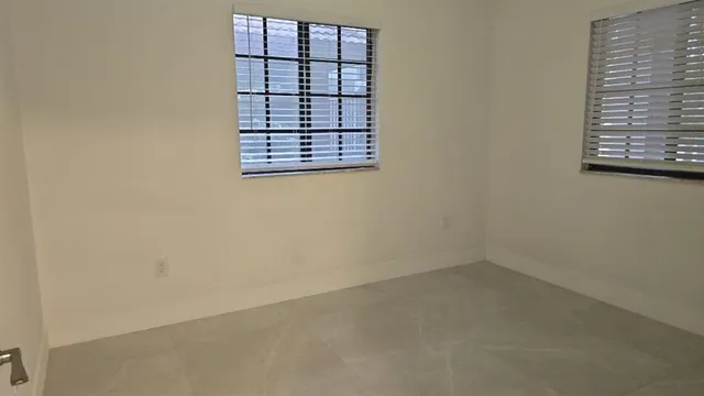 a bathroom with a toilet a sink and bathtub