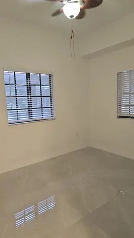 a bathroom with a sink a toilet and bathtub