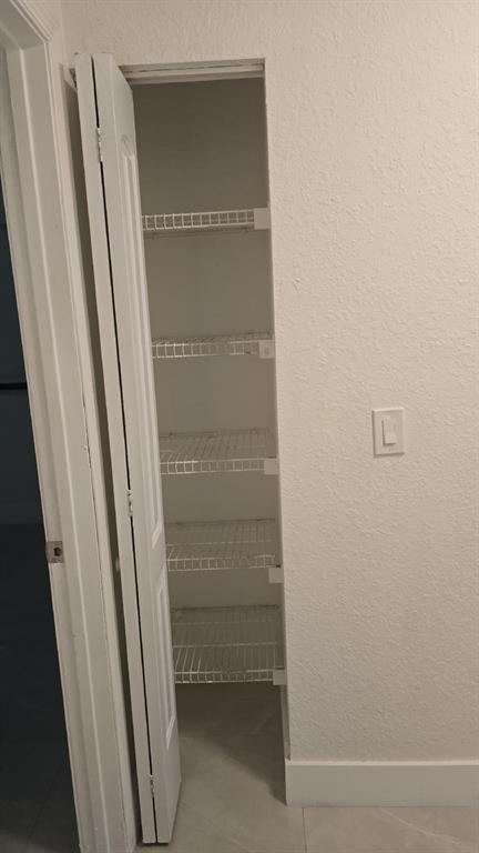 2801 Riverside Drive, Unit 104 Coral Springs, FL 33065 - Photo 19 of 22 a view of walk in closet