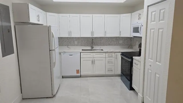 an empty room with a fan