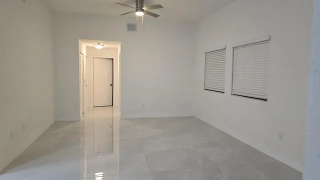 an empty room with windows