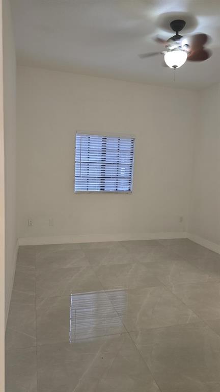 2801 Riverside Drive, Unit 104 Coral Springs, FL 33065 - Photo 9 of 22 an empty room with a empty space