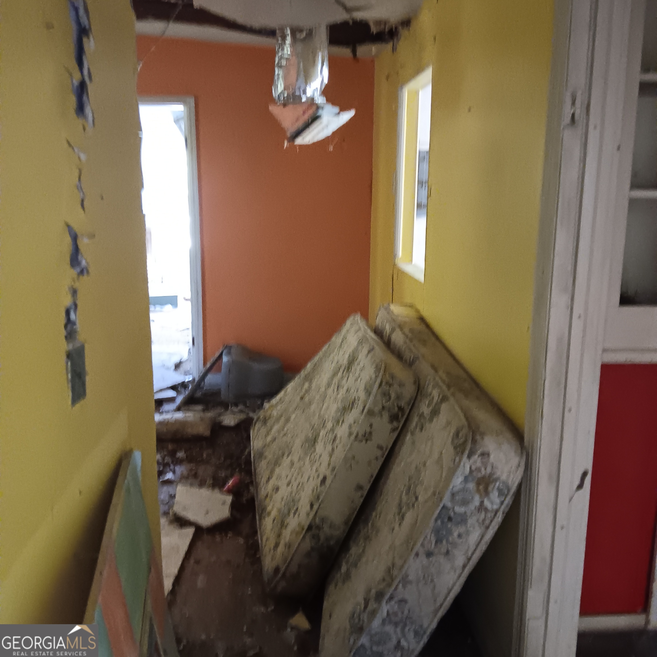 4377 Rock Mills Road LaGrange, GA 30240 - Photo 17 of 27 a bed sitting in a bedroom next to a window