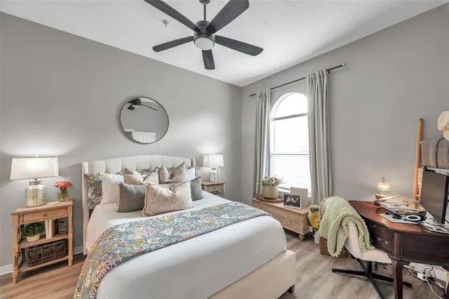 a bedroom with bed and a window