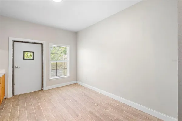 an empty room with windows