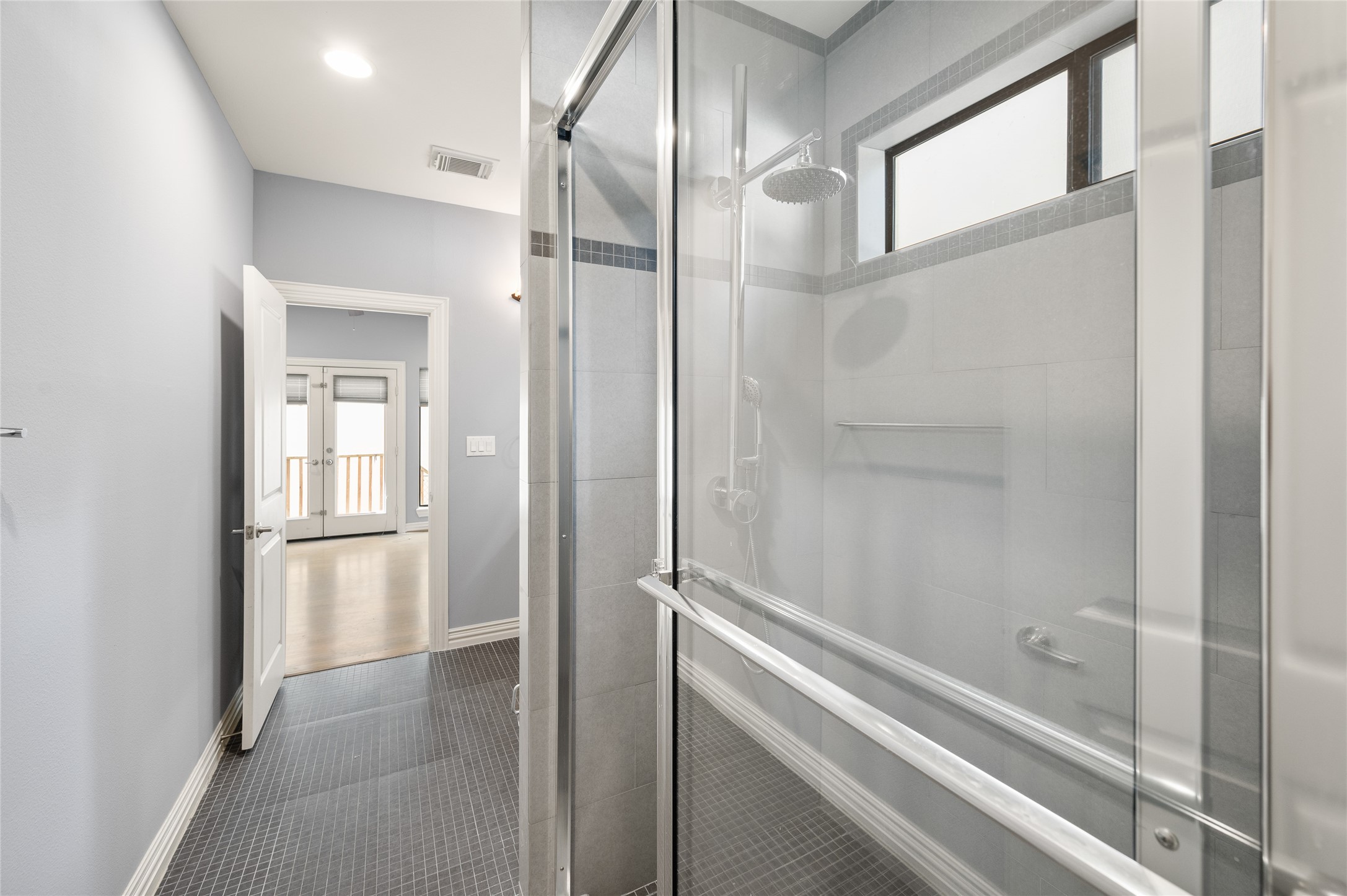 2310 Camden Drive Houston, TX 77021 - Photo 13 of 39 a bathroom with a glass shower door