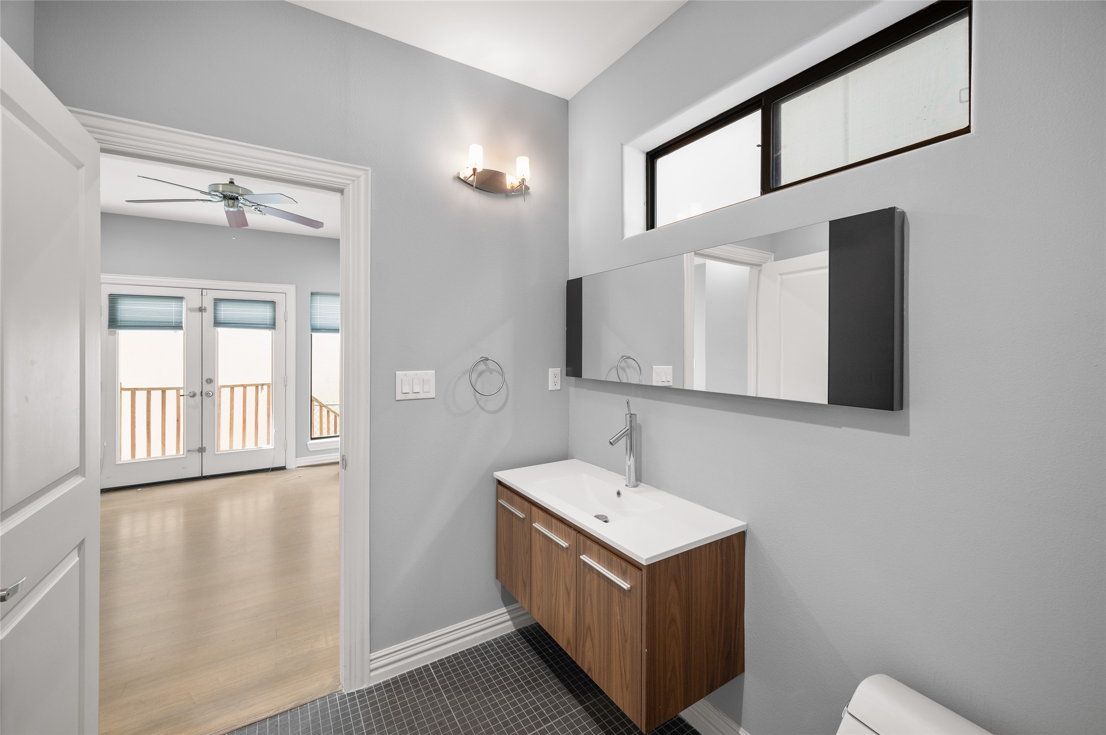 2310 Camden Drive Houston, TX 77021 - Photo 14 of 39 a bathroom with a sink vanity and mirror