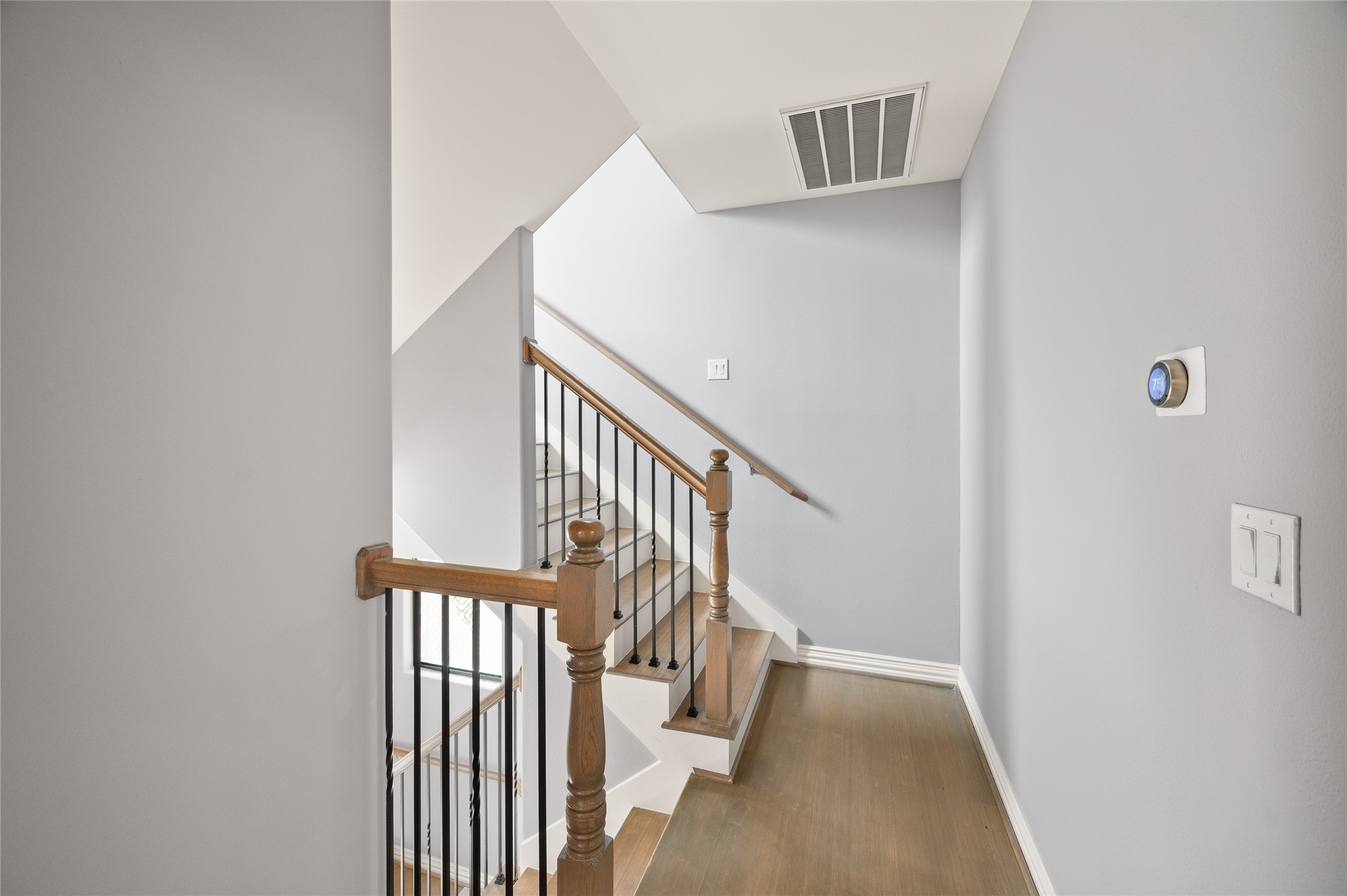 2310 Camden Drive Houston, TX 77021 - Photo 26 of 39 a view of staircase with railing and white walls
