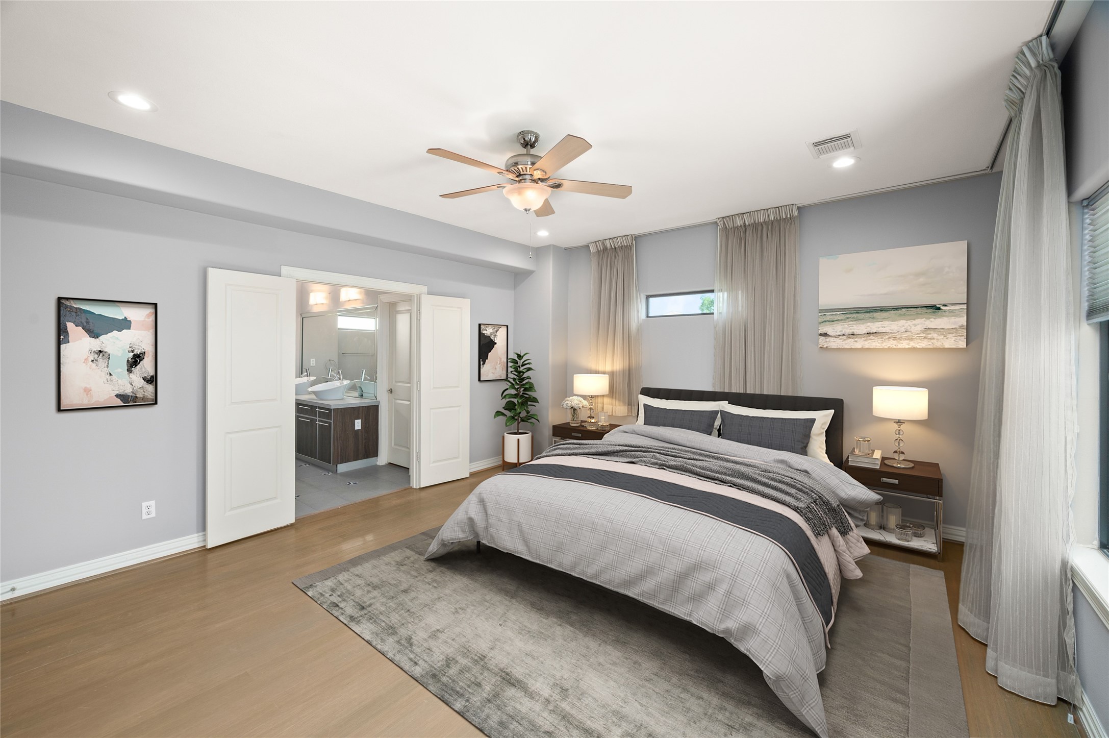 2310 Camden Drive Houston, TX 77021 - Photo 28 of 39 a bedroom with a large bed and a chandelier