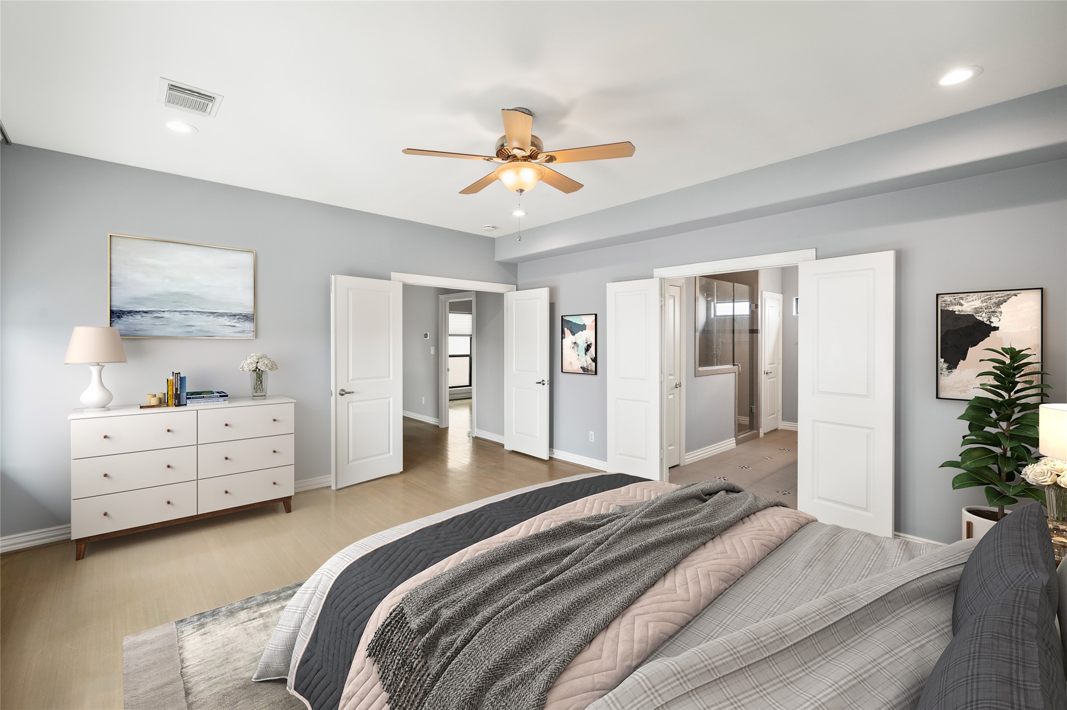 2310 Camden Drive Houston, TX 77021 - Photo 30 of 39 a bedroom with a bed and a chandelier fan