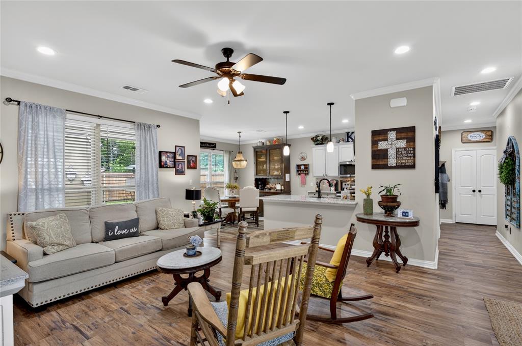 701 West Lamberth Road Sherman, TX 75092 - Photo 10 of 37 Spacious living area featuring wood-finish flooring and recessed lighting