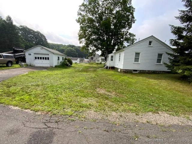 a front view of a house with yard