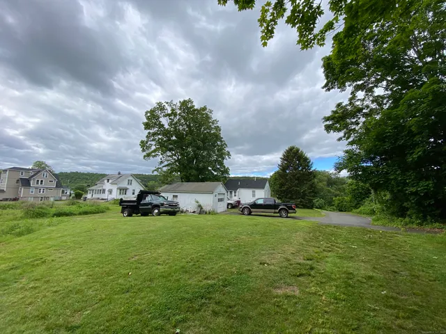 a view of a trees in front of a building