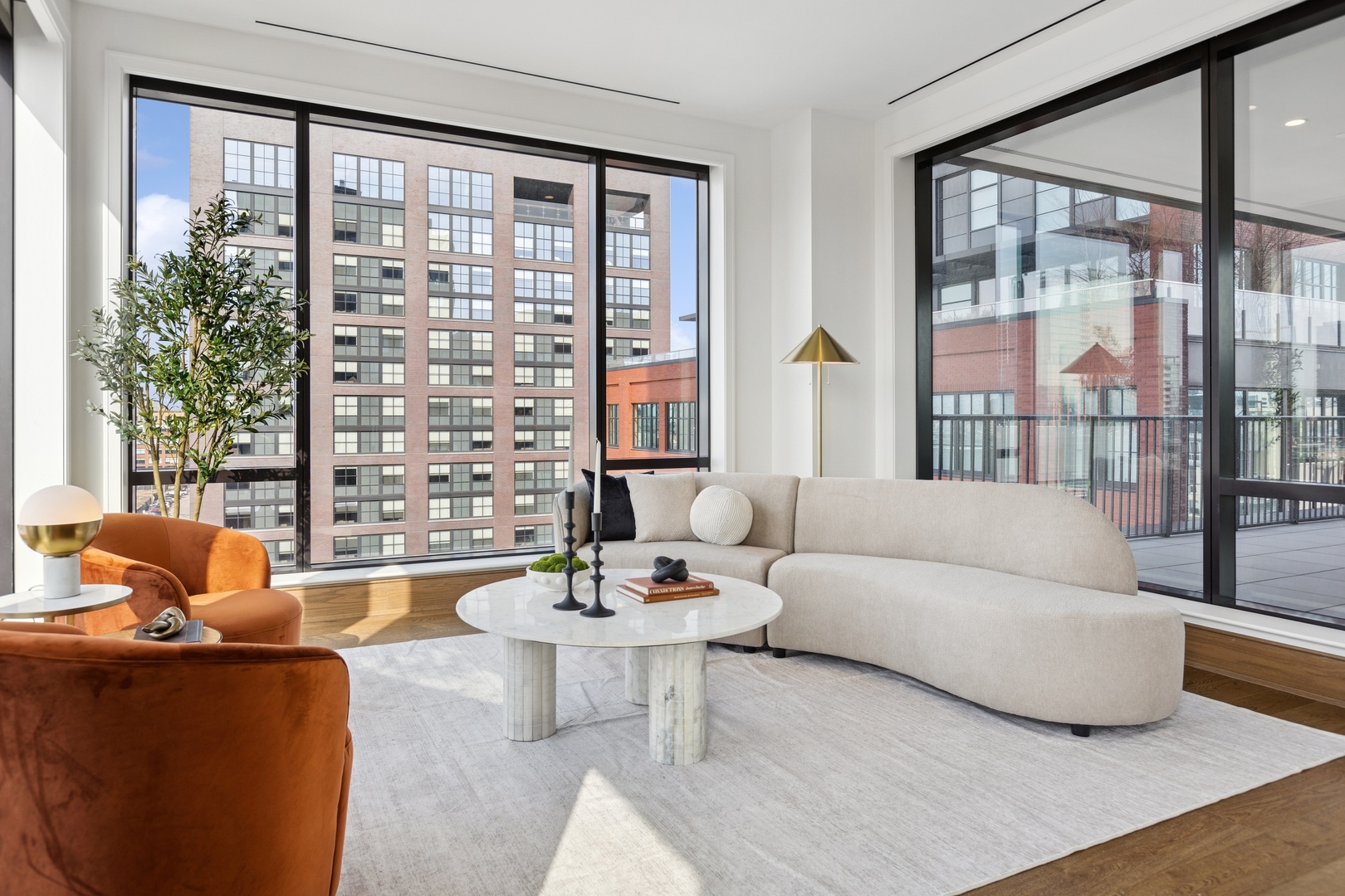 21 North May Street, Unit 903 Chicago, IL 60607 - Photo 11 of 55 a living room with furniture and a large window