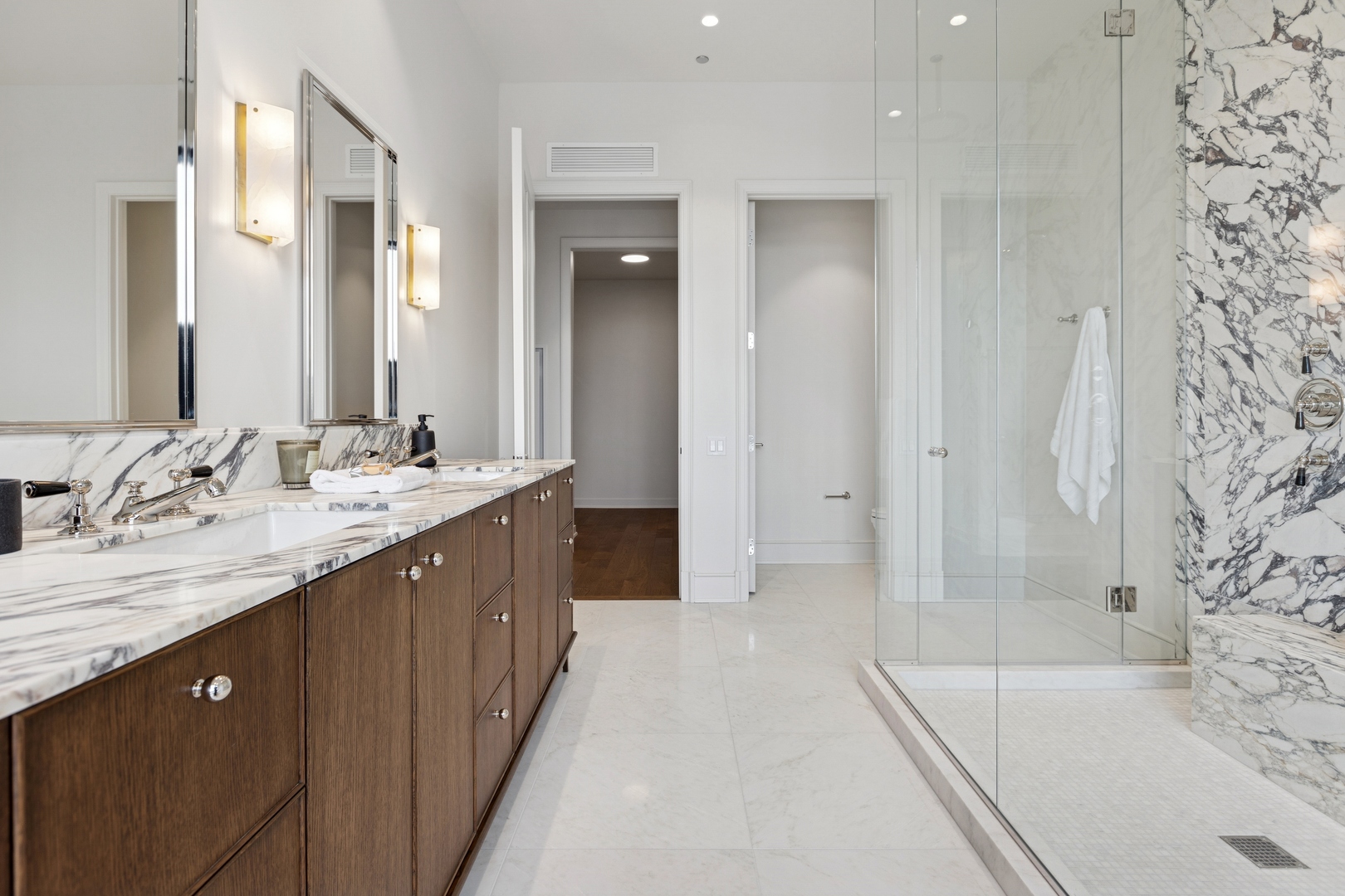 21 North May Street, Unit 903 Chicago, IL 60607 - Photo 36 of 55 a bathroom with a double vanity sink and a mirror