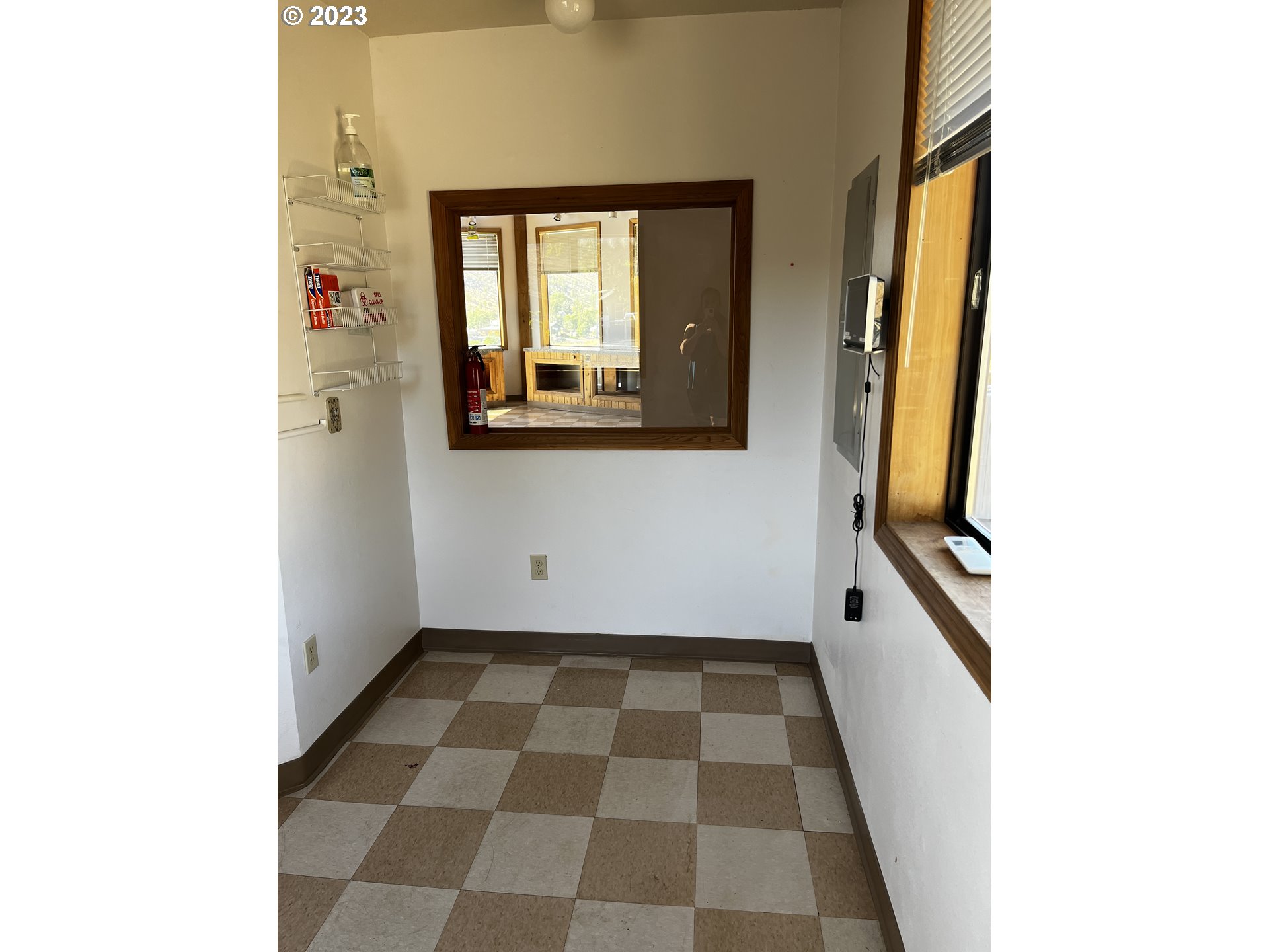 304 Elrod Place Maupin, OR 97037 - Photo 14 of 25 a view of a bathroom with a black and white checkered floor