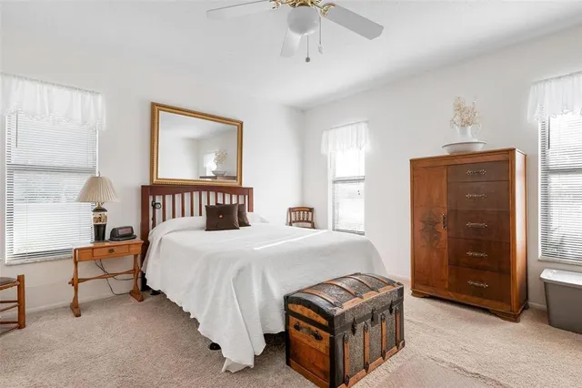 a bedroom with a bed and a cabinets