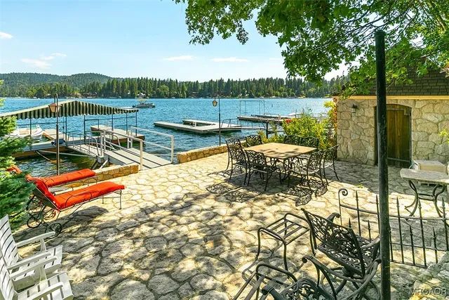a view of a balcony with two chairs
