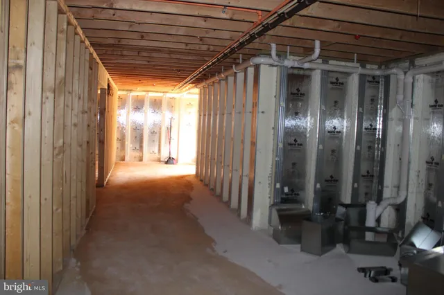 a view of staircase with rug floor