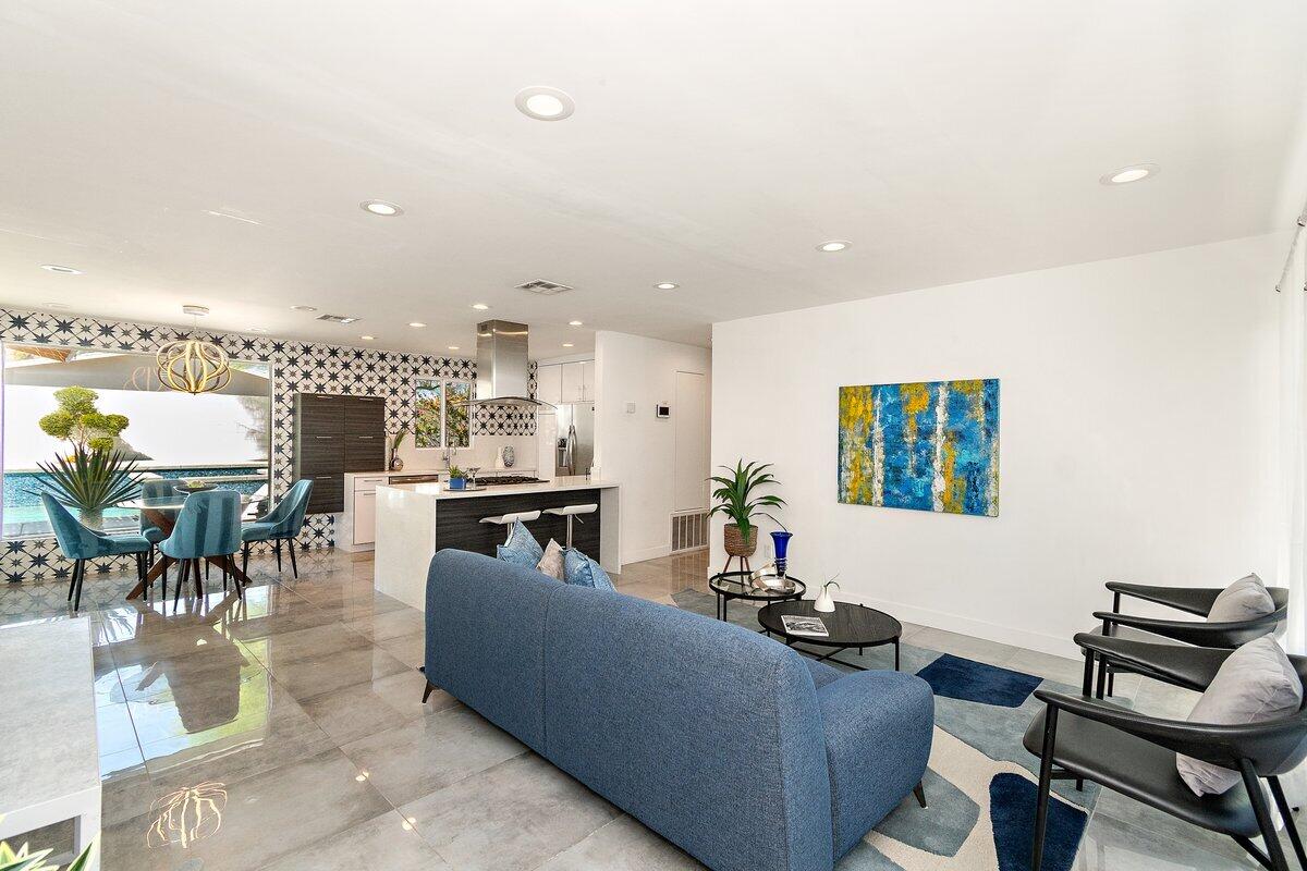 3005 North Chuperosa Road Palm Springs, CA 92262 - Photo 11 of 34 a living room with furniture and fireplace