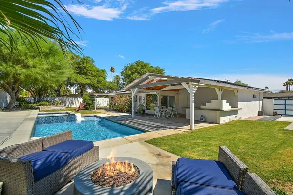 a view of a house with swimming pool