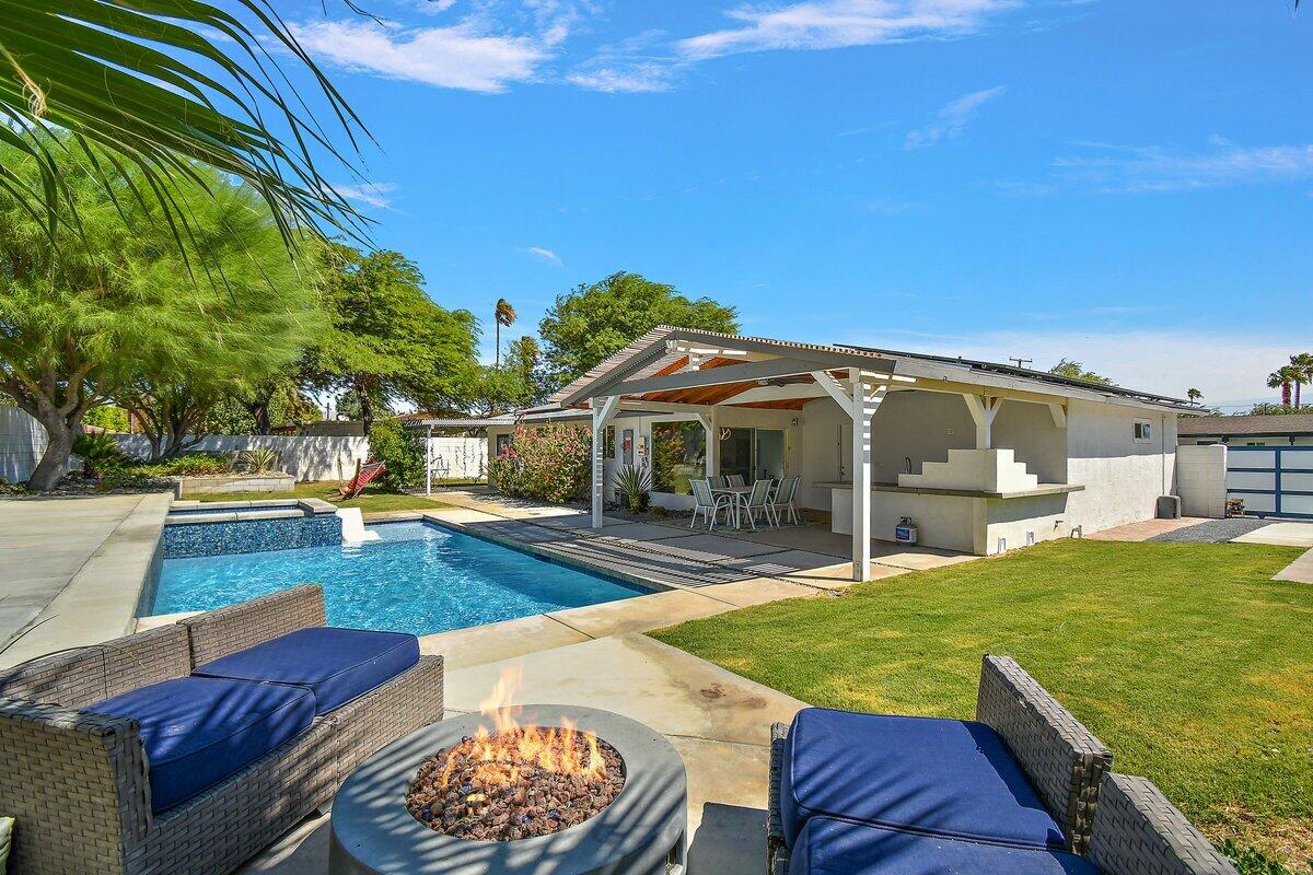 3005 North Chuperosa Road Palm Springs, CA 92262 - Photo 2 of 34 a view of a house with swimming pool