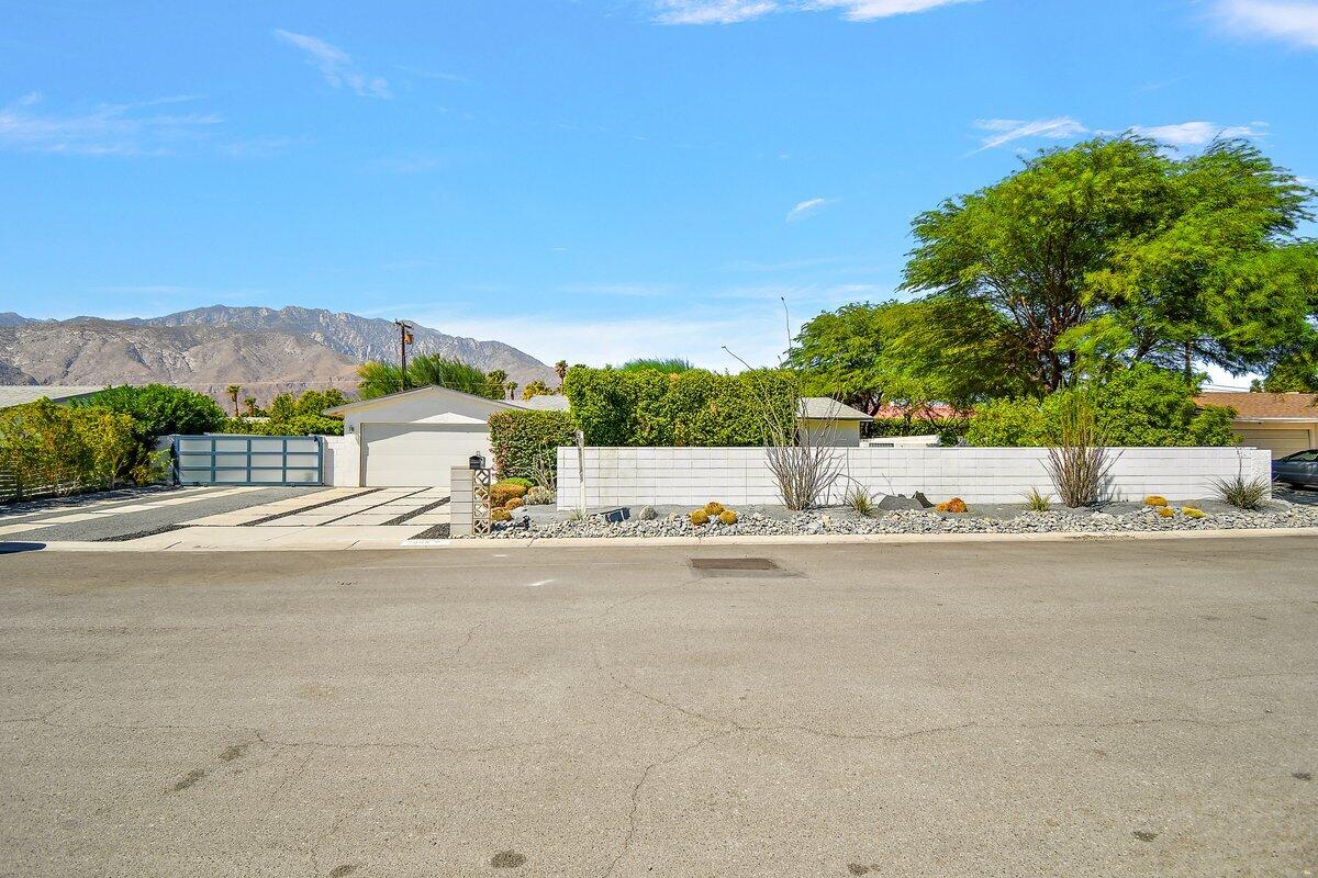 3005 North Chuperosa Road Palm Springs, CA 92262 - Photo 32 of 34 a view of a street with a house in the background
