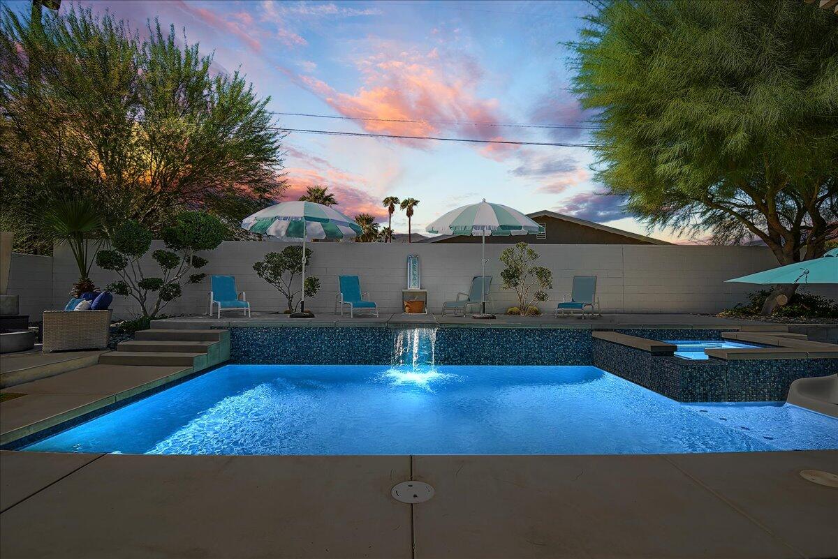 3005 North Chuperosa Road Palm Springs, CA 92262 - Photo 33 of 34 a view of a swimming pool with an outdoor seating