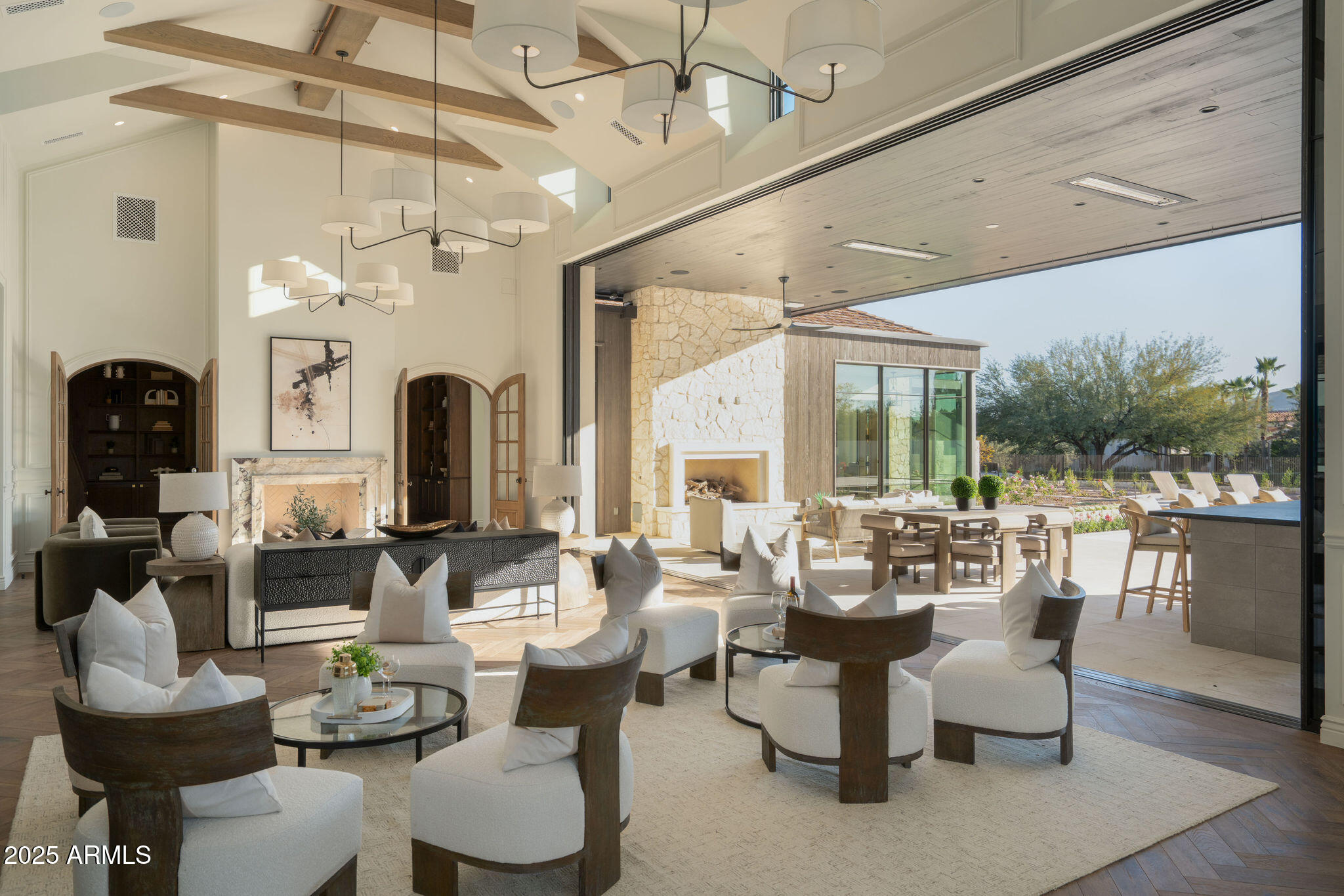 5902 East Cactus Wren Road Paradise Valley, AZ 85253 - Photo 13 of 72 a living room with fireplace furniture and a large window