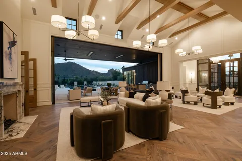 a bedroom with double bed and a window