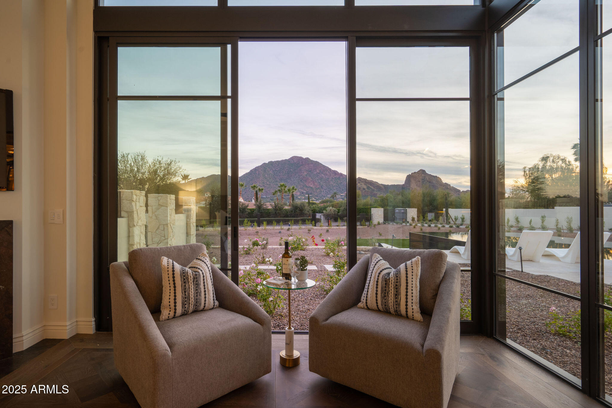 5902 East Cactus Wren Road Paradise Valley, AZ 85253 - Photo 39 of 72 a balcony view with a couch and large window with outer view