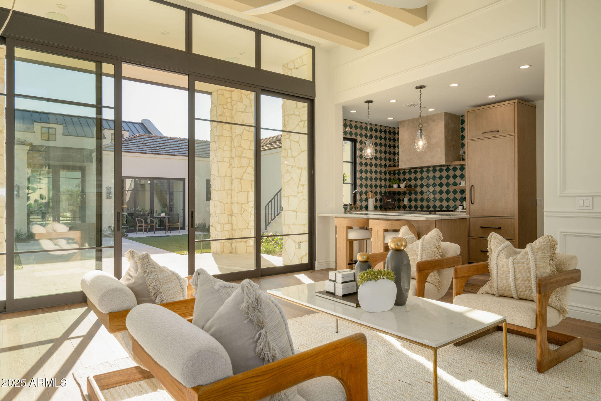 5902 East Cactus Wren Road Paradise Valley, AZ 85253 - Photo 57 of 72 a living room with furniture and a large window