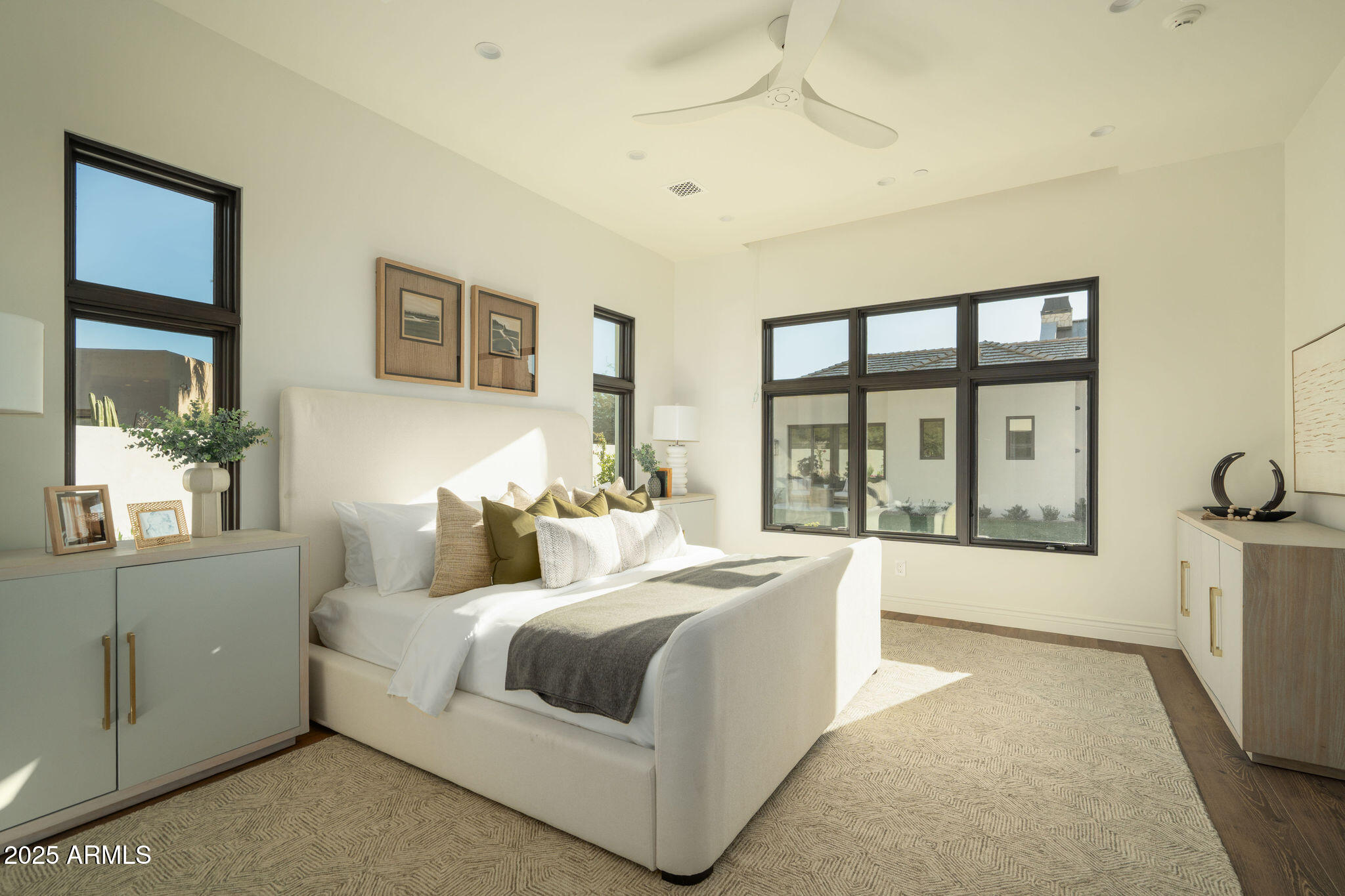 5902 East Cactus Wren Road Paradise Valley, AZ 85253 - Photo 61 of 72 a bedroom with a large bed and a large window