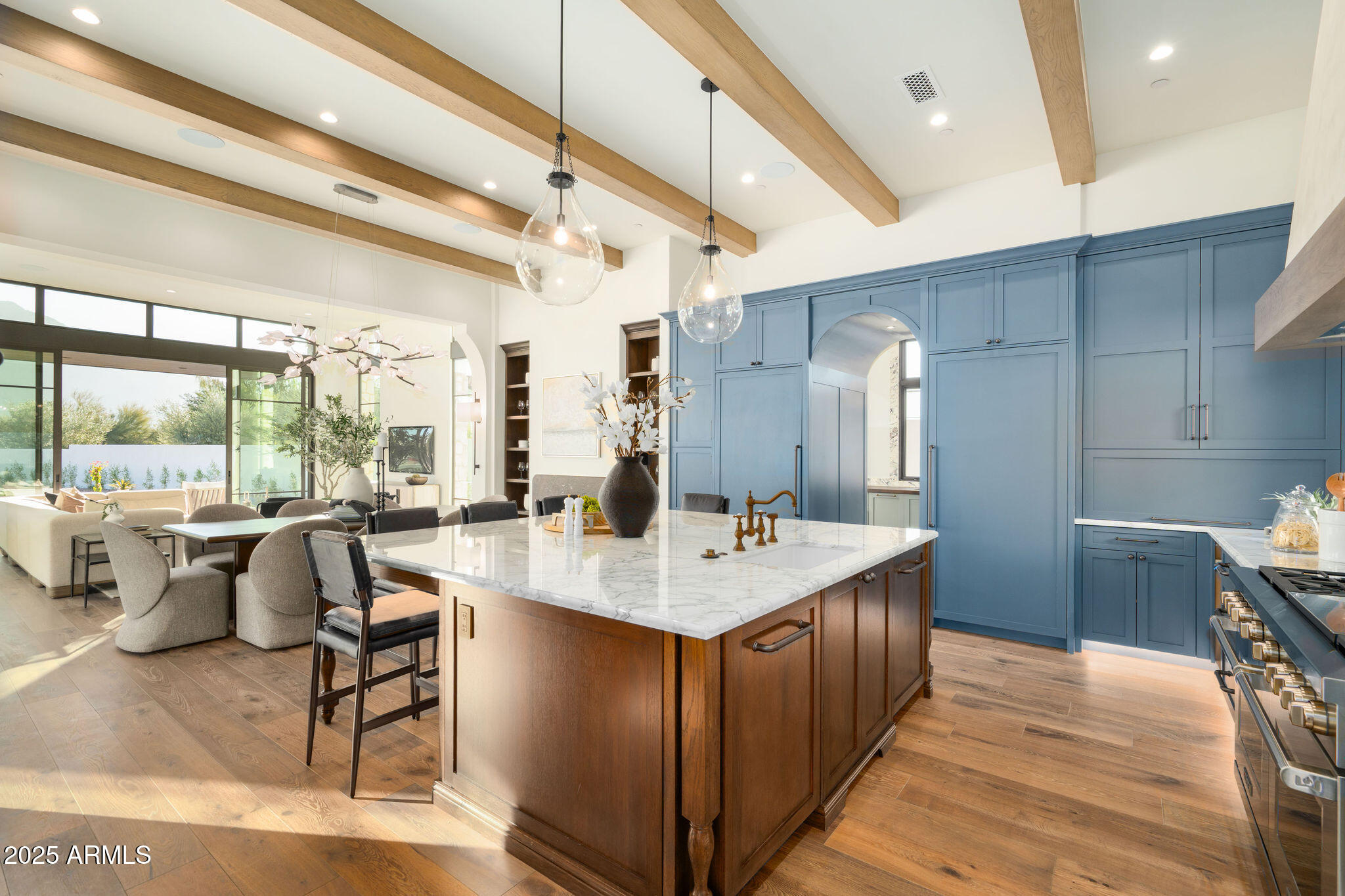 5902 East Cactus Wren Road Paradise Valley, AZ 85253 - Photo 8 of 72 a large white kitchen with a large window