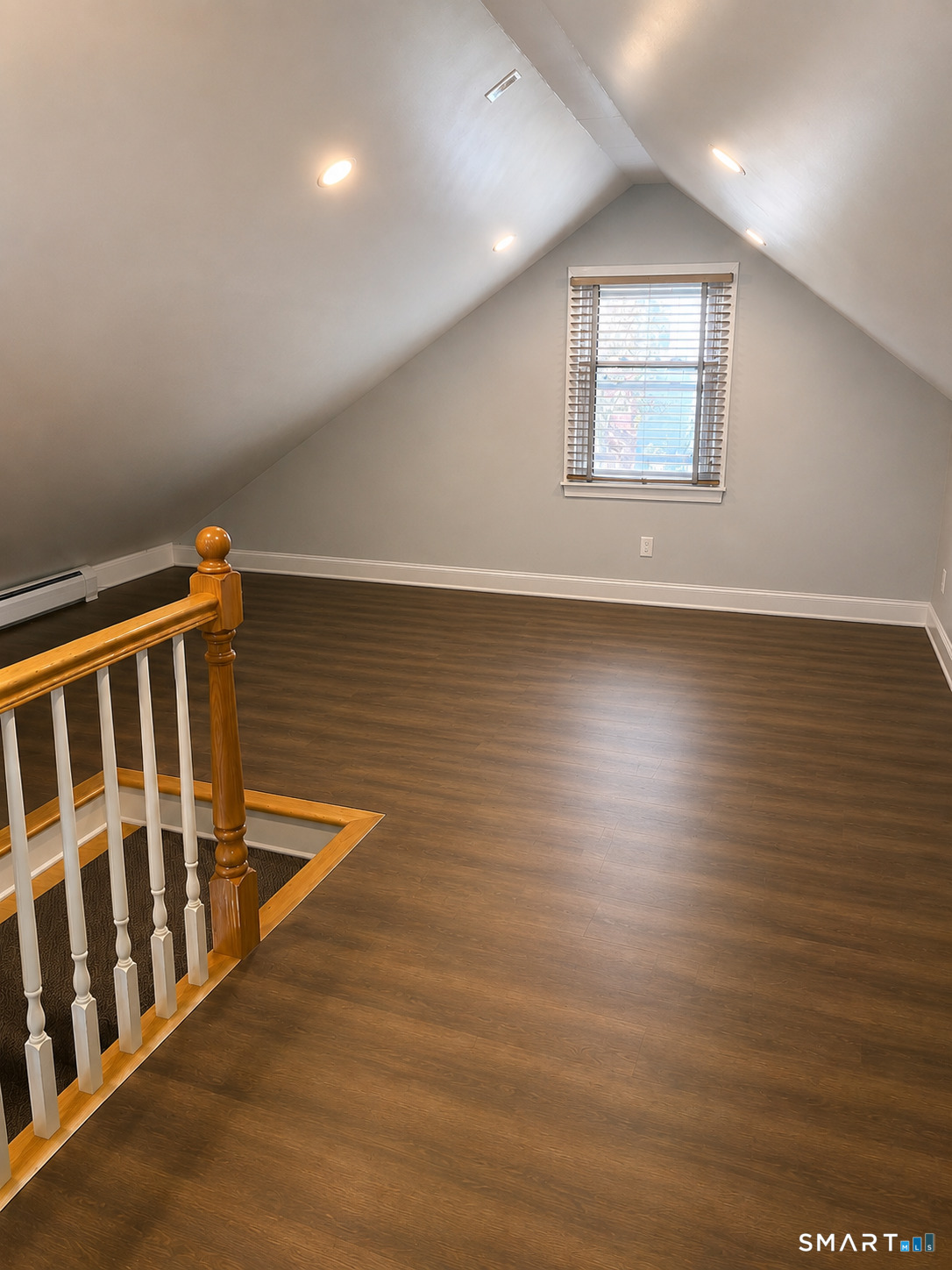 2182 North Benson Road Fairfield, CT 06824 - Photo 13 of 21 a view of wooden floor and windows in a room
