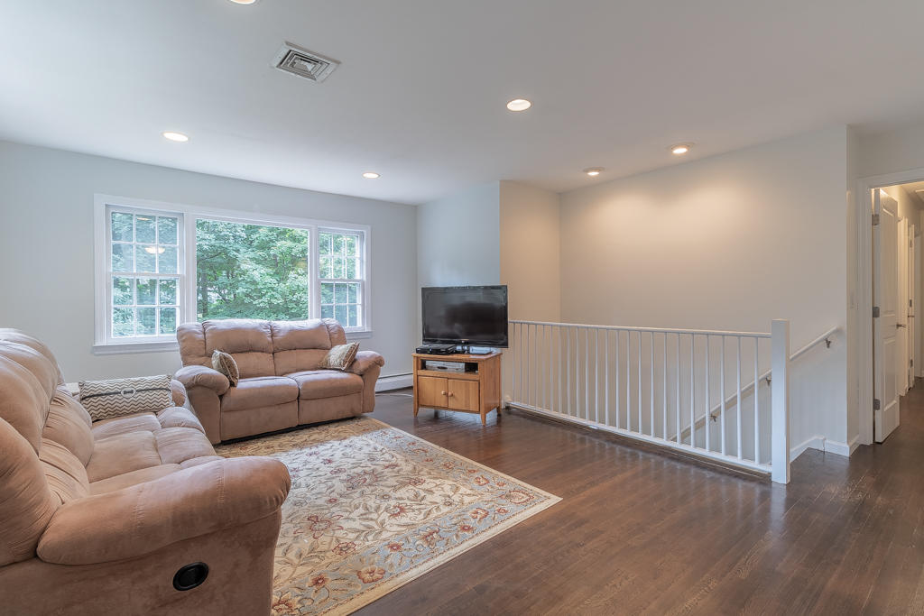 3 Hollow Spring Road Norwalk, CT 06854 - Photo 13 of 30 a living room with furniture and a flat screen tv