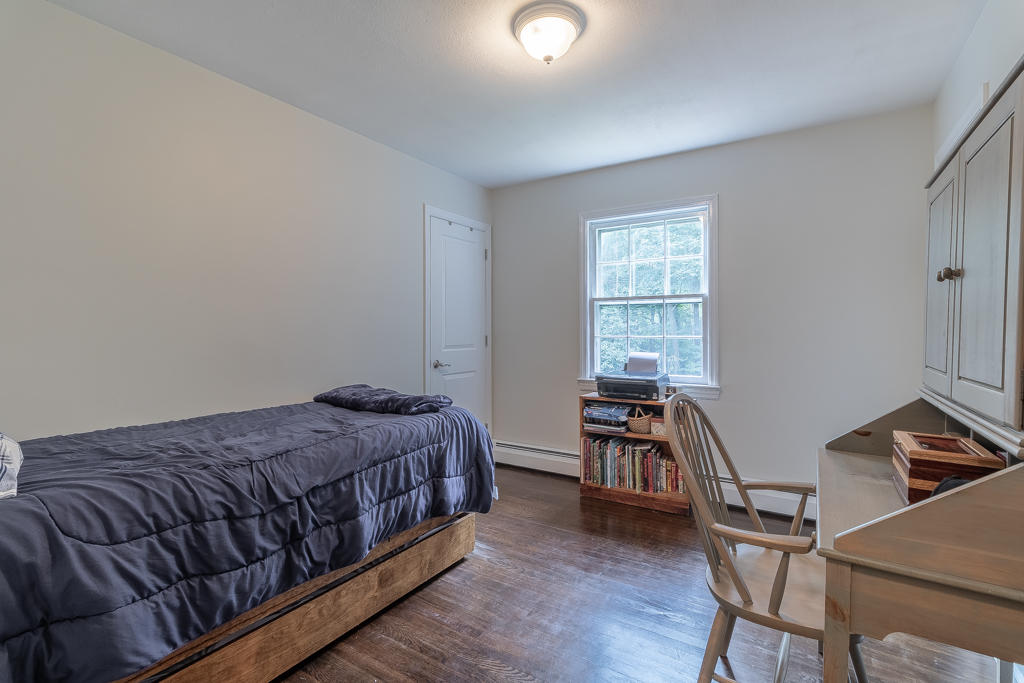 3 Hollow Spring Road Norwalk, CT 06854 - Photo 14 of 30 a bedroom with a bed and a desk