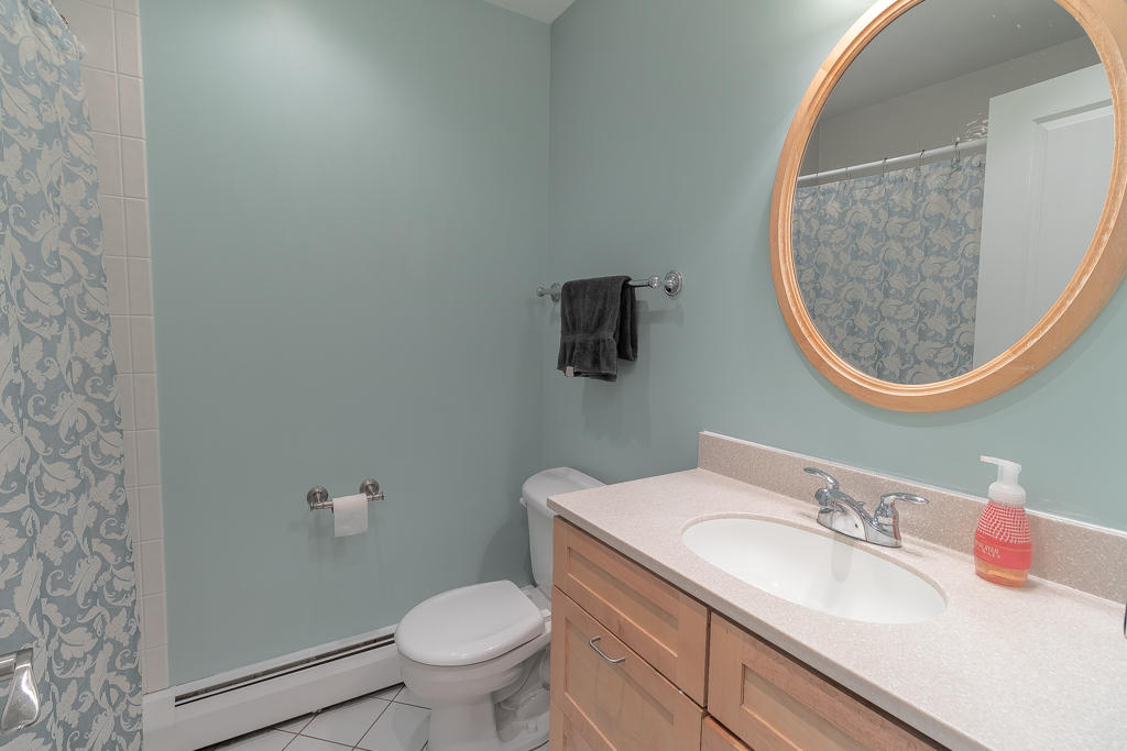 3 Hollow Spring Road Norwalk, CT 06854 - Photo 15 of 30 a bathroom with a sink and a mirror